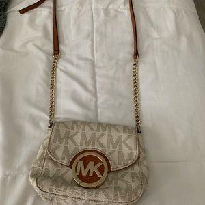Brown and white Michael kors purse